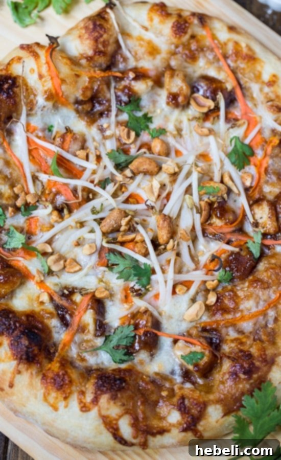 Dough stretching for Thai Chicken Pizza