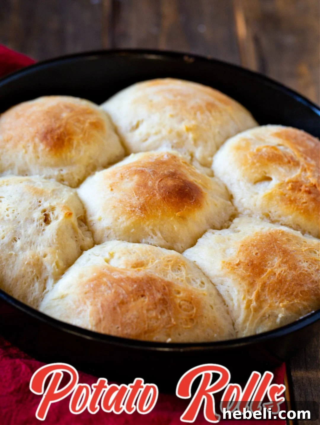 Freshly baked Potato Rolls arranged in a round baking pan, ready to serve.
