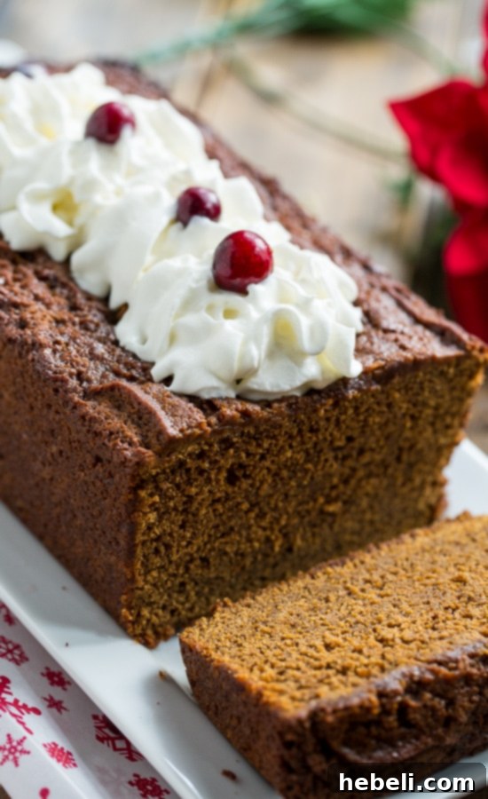 Two loaves of Sweet and Spicy Gingerbread, baked to perfection and cooling on a wire rack.