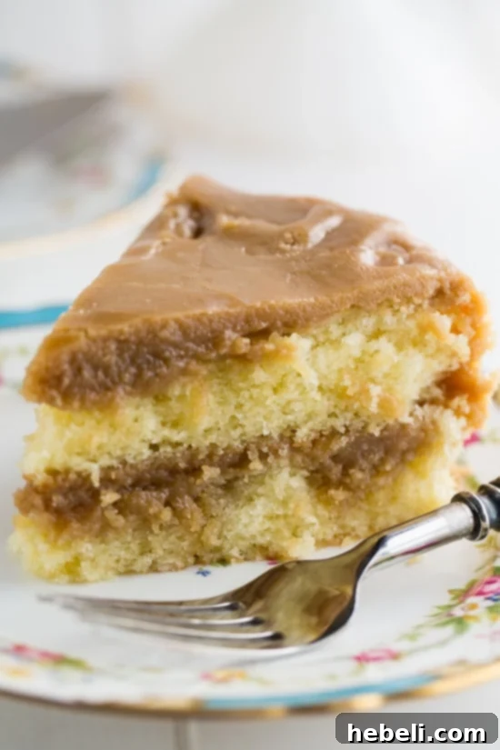 Southern Caramel Cake - A moist vanilla cake generously slathered with ultra-sweet caramel icing, ready for serving.