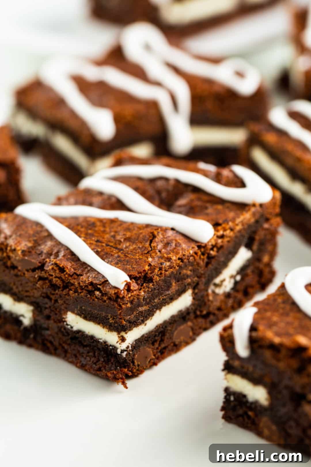 An inviting plate of freshly baked Oreo Stuffed Brownies, perfectly arranged and ready for serving.