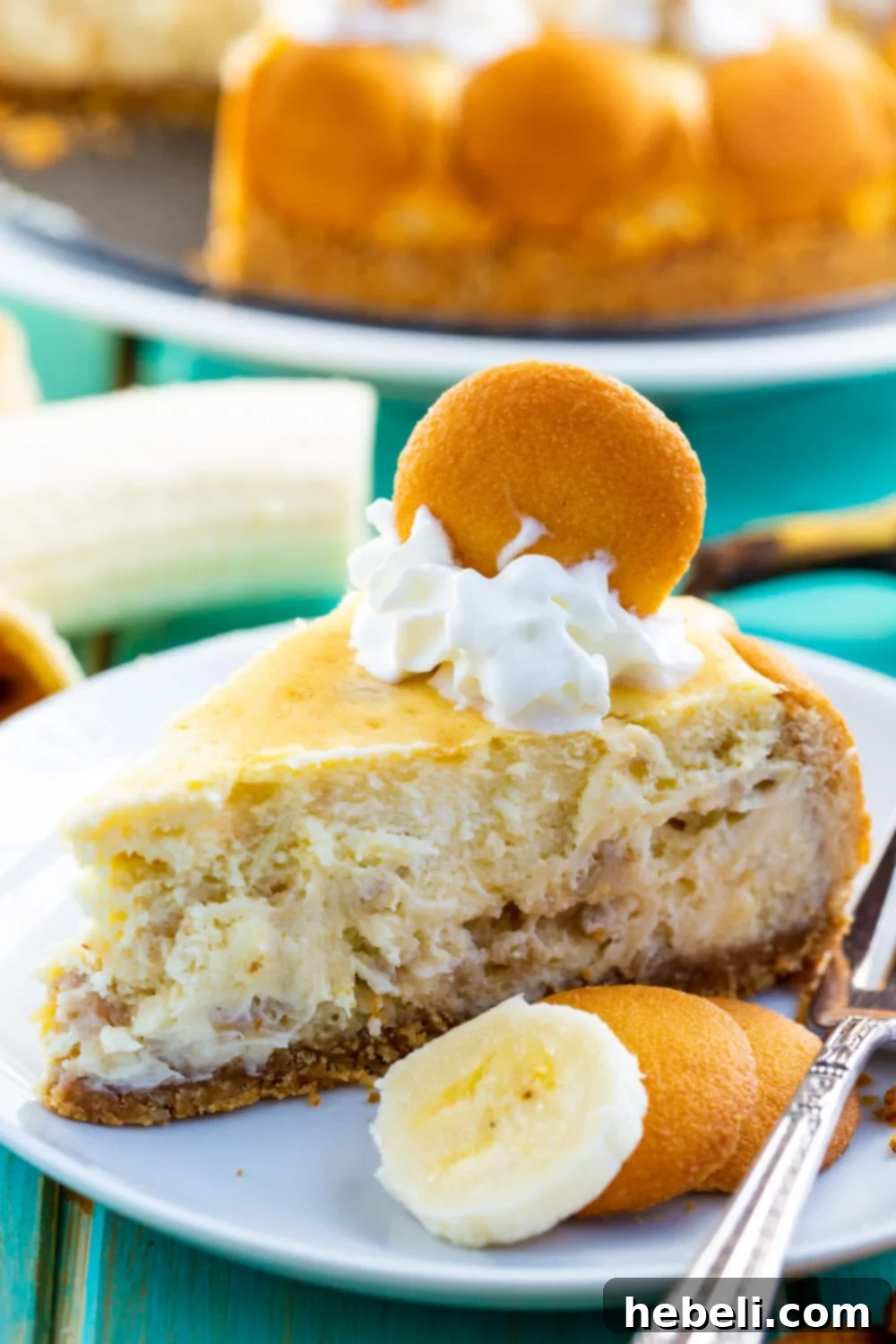 Heavenly Banana Pudding Cheesecake 3 Slice of Banana Pudding Cheesecake on a plate.