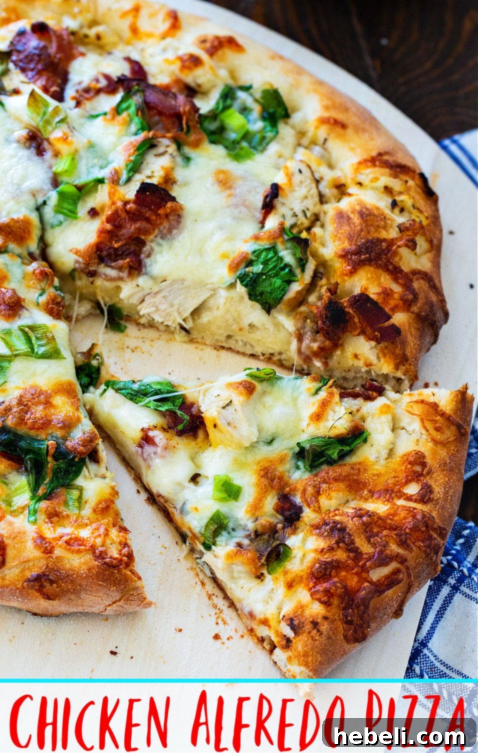 A beautifully presented, freshly baked Chicken Alfredo Pizza, garnished and ready to serve.