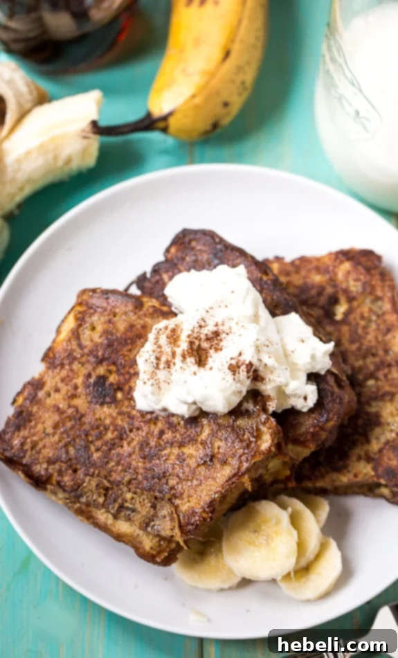 Close-up of fluffy White Chocolate Banana Bread French Toast stack