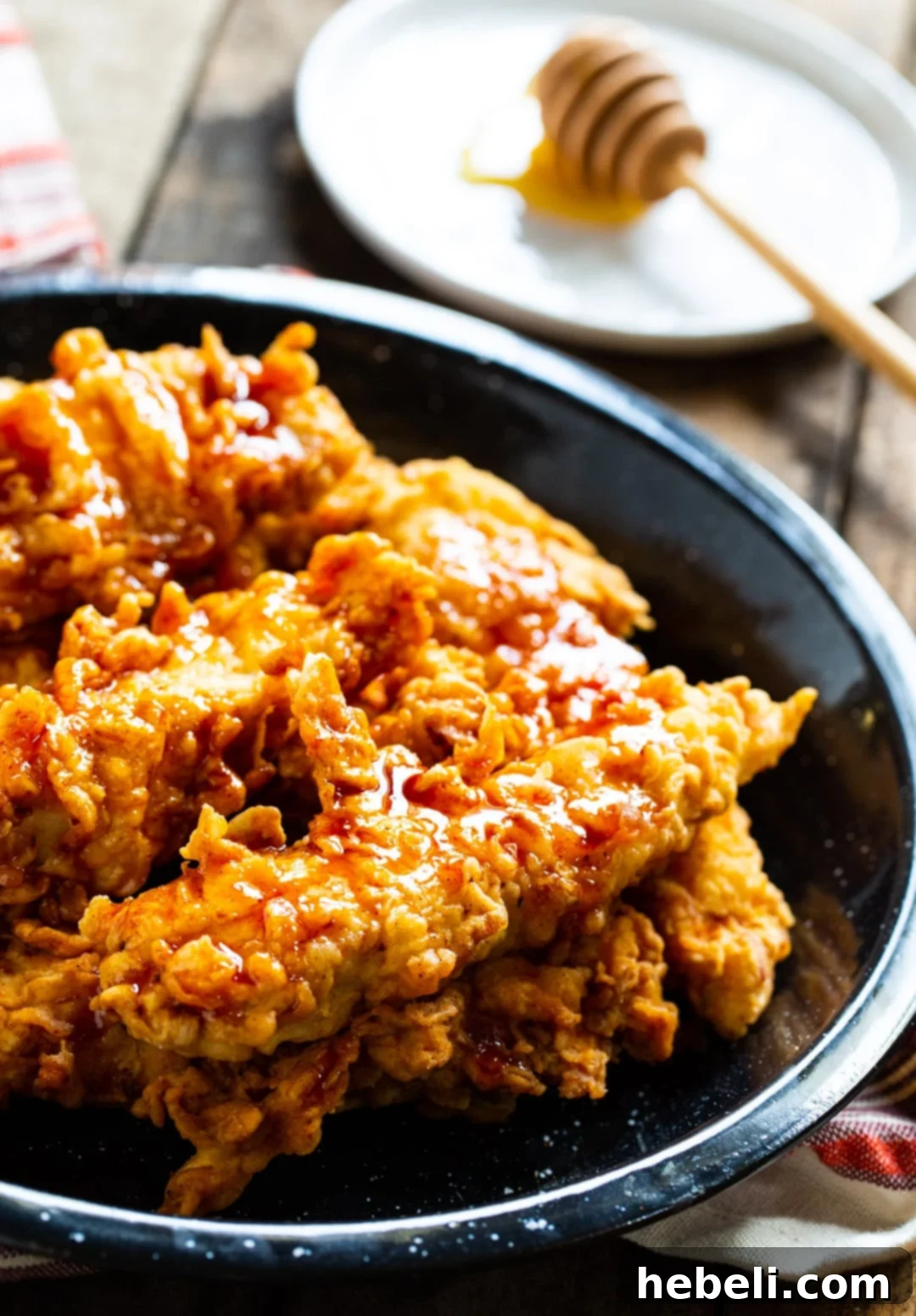 Serving plate filled with Honey Chipotle Chicken Crispers, ready to be eaten.