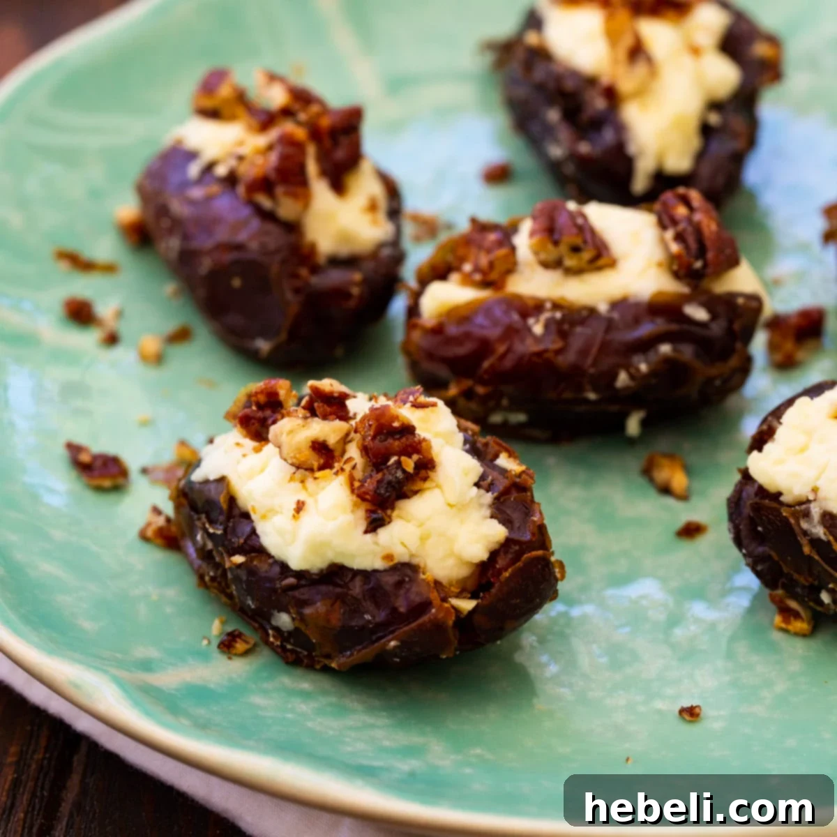 Whipped Feta Stuffed Dates arranged beautifully on a plate.