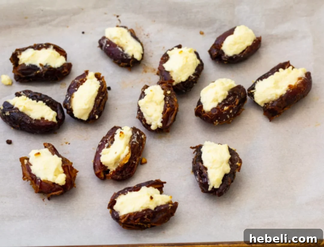 Close-up shot of dates stuffed generously with whipped feta.