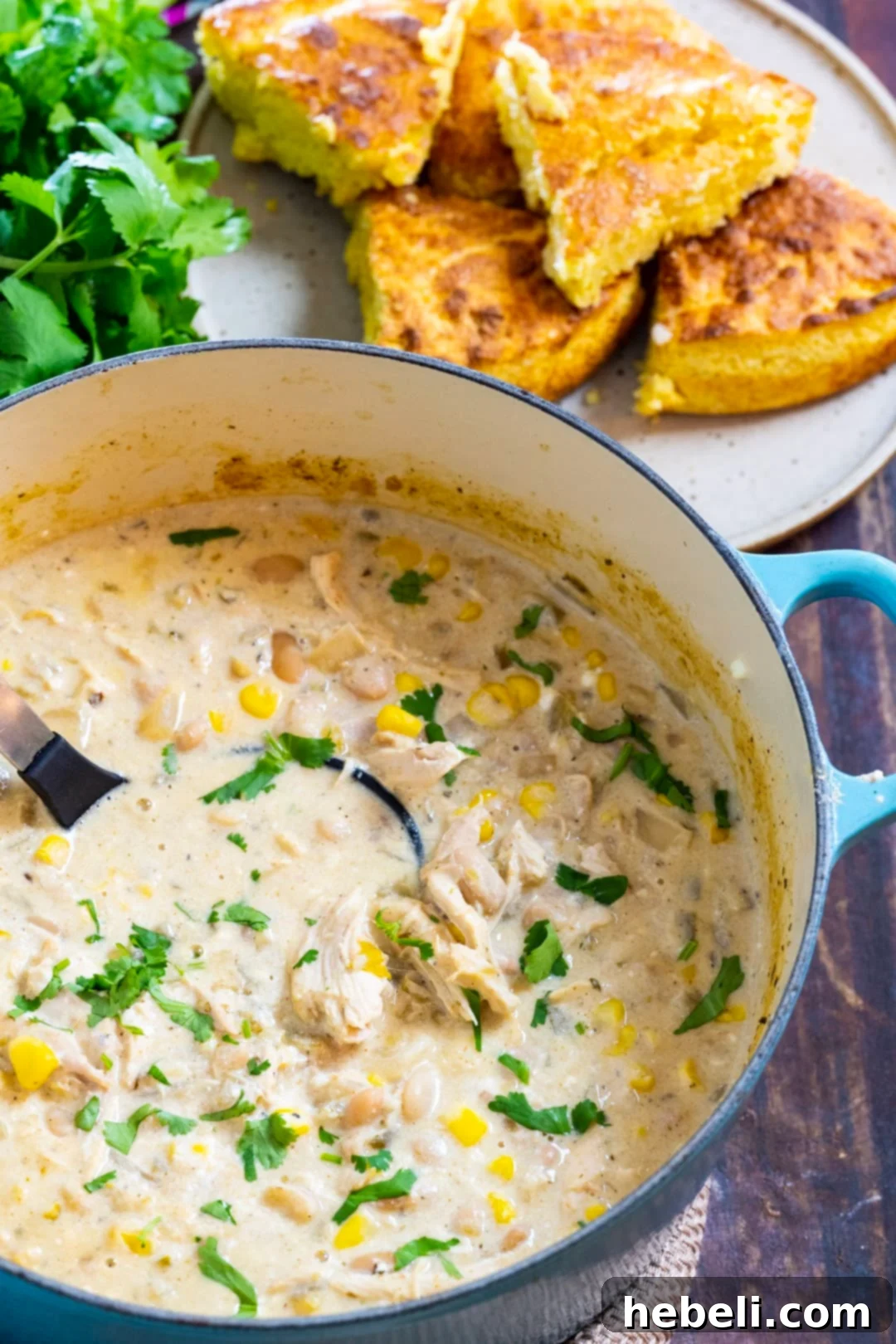 White Chicken Chili simmering in a Dutch oven
