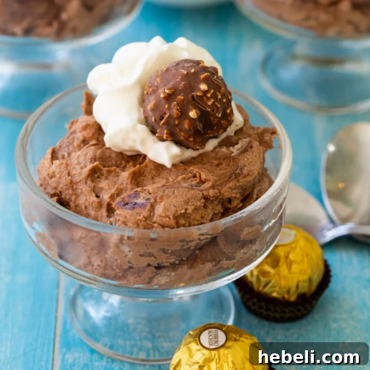 Nutella Dream Mousse 2 Nutella Mousse in a glass bowl. Rich and creamy dessert.