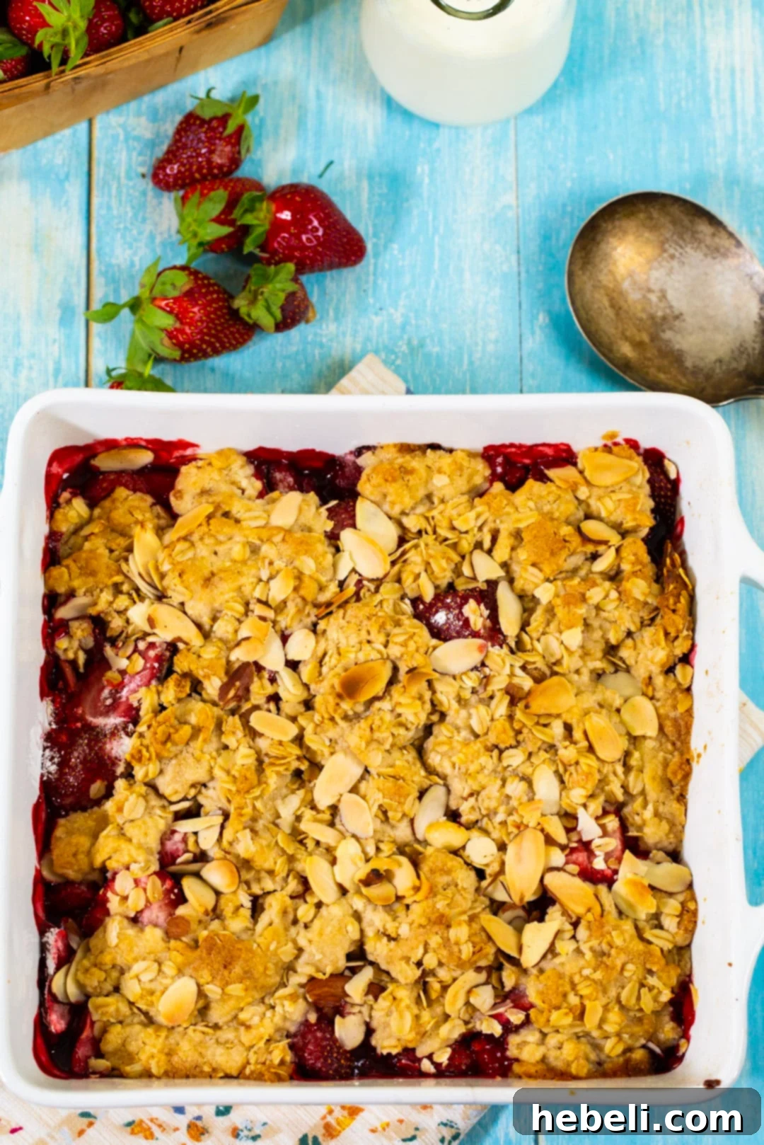 Rustic Strawberry Crumble 3 Close-up of baked Strawberry Crisp, showing the golden oat topping and bubbling strawberry filling.