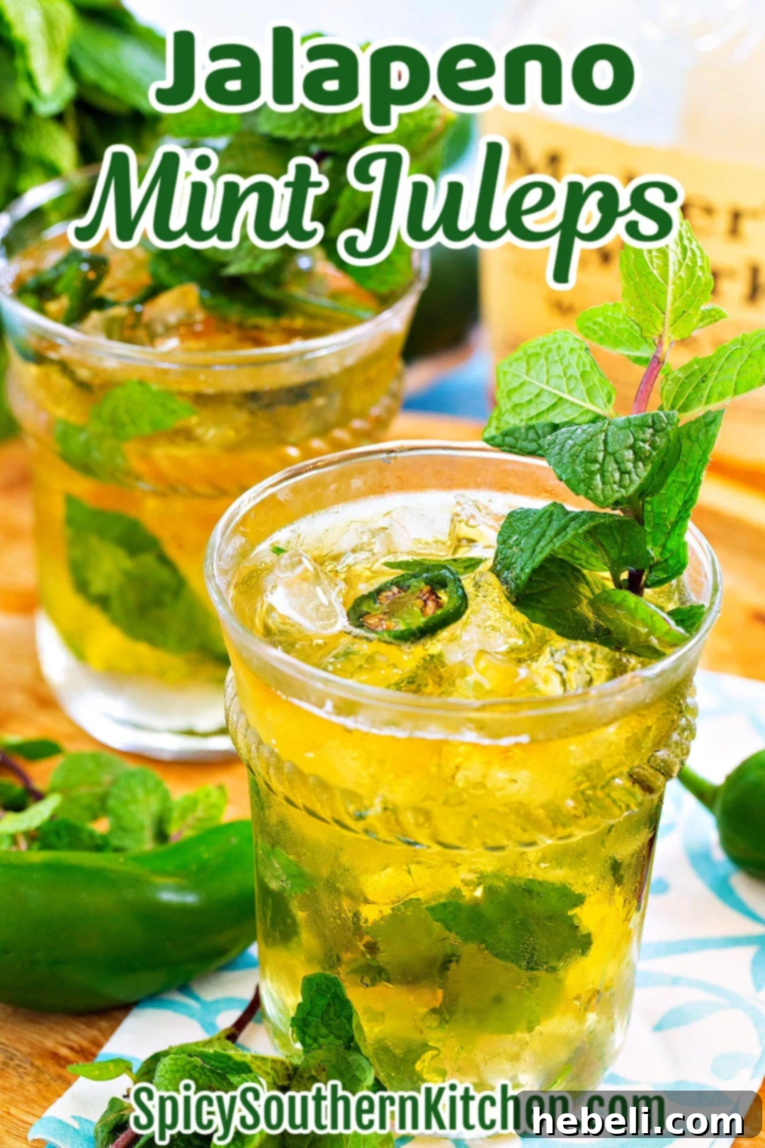 Southern Fire Julep 5 A close-up shot of a frosty Jalapeno Mint Julep, highlighting the crushed ice and fresh mint garnish.
