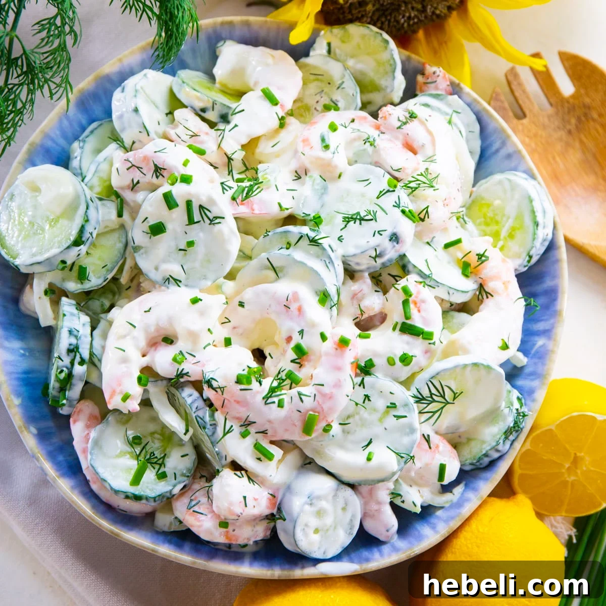 Refreshing Shrimp and Cucumber Salad with Zesty Dressing 2 Shrimp Cucumber Salad in a blue bowl.