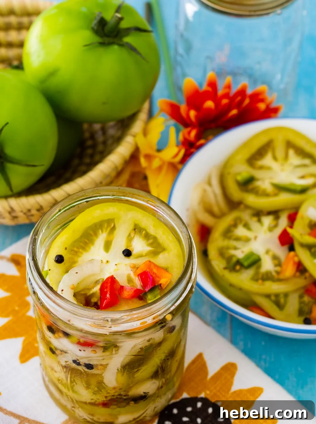 Pickled Green Tomatoes in a mason jar.