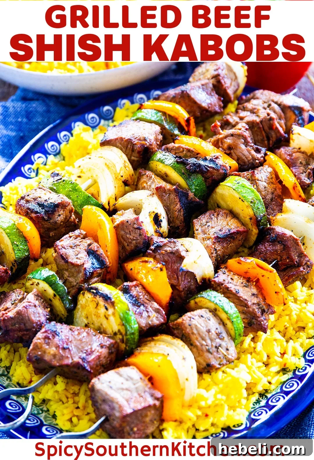Garlic Marinated Beef Shish Kabobs on the Grill 5 Grilled Beef Shish Kabobs over yellow rice.