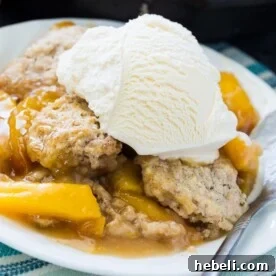 Skillet Bourbon Peach Cobbler with Cinnamon Sugar Dumplings
