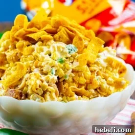 Fresh Corn Recipes to Try Before Summer Ends 14 Jalapeno Popper Corn Frito Salad in a bowl.