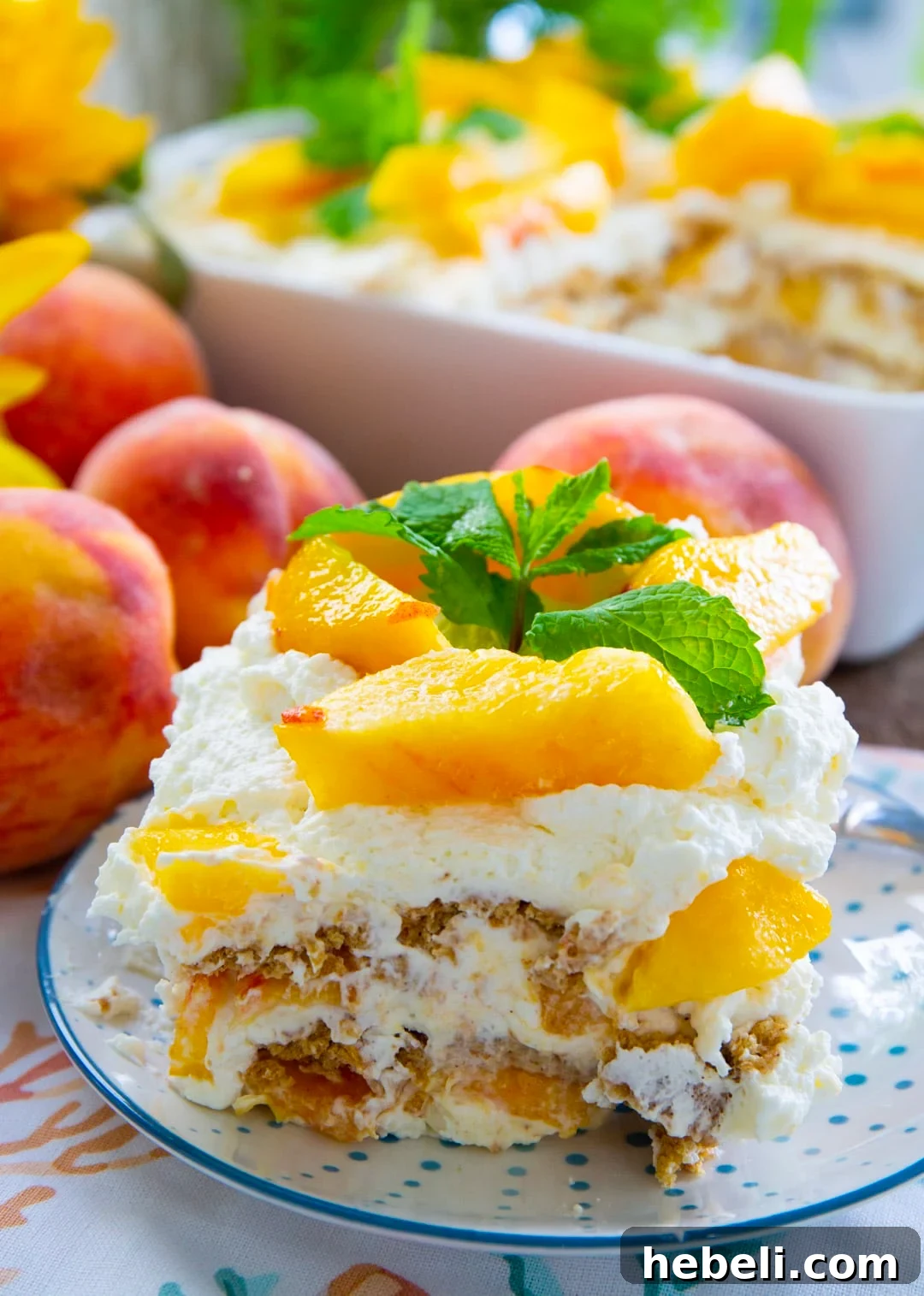 Slice of Peach Icebox Cake on a plate.