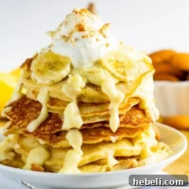 Banana Pudding Pancakes stacked on a plate.